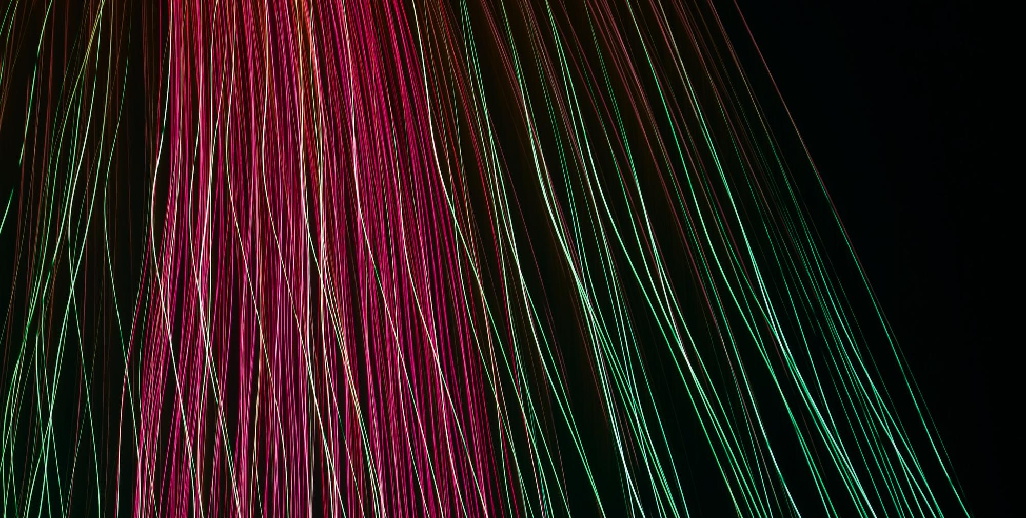 abstract neon thread embroidery on black fabric